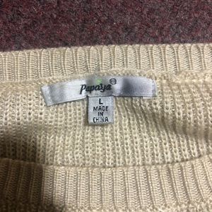 Super cream cute sweater with bows on it!